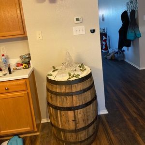 Full barrel liquor cabinet